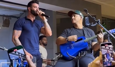 Gusttavo Lima aparece de surpresa e canta em restaurante de Campina Grande